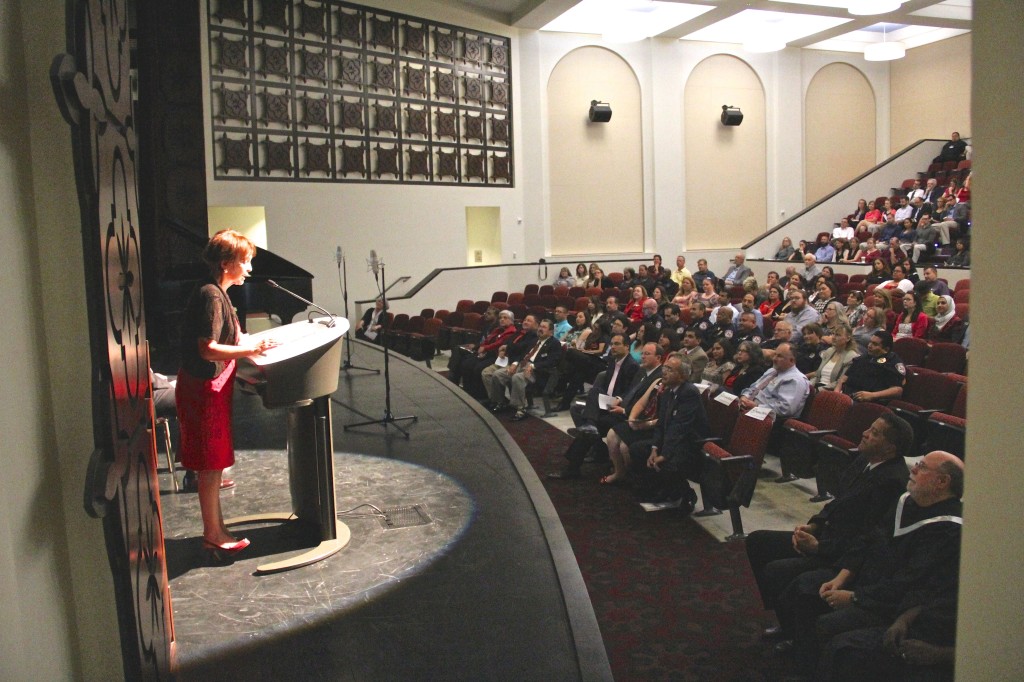 President Maria Hernandez Ferrier speaks in front of nearly 350 members of faculty and staff in the new University auditorium Friday during Convocation. Photo by Monica Lamadrid
