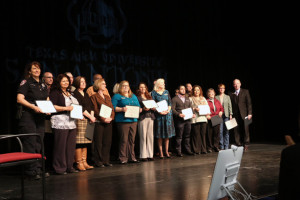 Recipients of The Five-Year Excellence Award receive some recognition Jan. 14, for their service to the university during Spring 2016 convocation at the auditorium on main campus. Photo by Amanda Lozano
