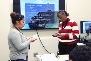 Student activities director, Cheryl Le Gras and student Vanessa Cruz practiced using proactive language in scenarios during the workshop. Students learned the differences between using proactive and reactive language. Photo by Ami Sarabia