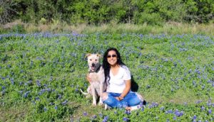 "Yay for spring and bluebonnets!" reads a facebook caption of Joyce Medina and her dog, Caleb. Medina owned two dogs, Caleb and Snickers, who accompanied her on her travels. 